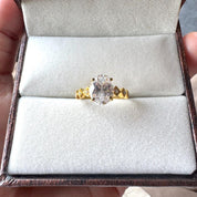 Oval Cut Man Made Diamond Ring with Side Stones