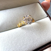 Oval Cut Man Made Diamond Ring with Side Stones
