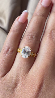Oval Cut Man Made Diamond Ring with Side Stones